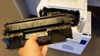 How to change toner CE505A in HP LaserJet P2035 [upl. by Anikahs301]